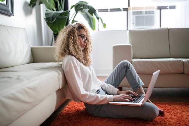 thought-catalog-Nv-vx3kUR2A-unsplash (1) young black woman researching the benefits of medical aid cape town